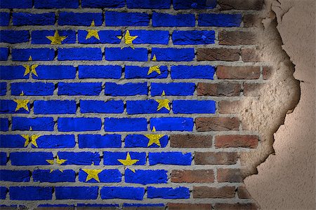 Dark brick wall texture with plaster - flag painted on wall - EU Stock Photo - Budget Royalty-Free & Subscription, Code: 400-07794191