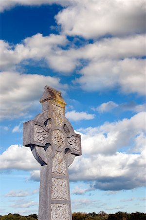 simsearch:400-08254774,k - an old celtic cross in an irish graveyard with blue cloudy sky Stock Photo - Budget Royalty-Free & Subscription, Code: 400-07794397