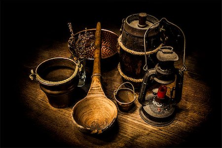 stein - Old and rusty kitchen tools on a wooden table Photographie de stock - Aubaine LD & Abonnement, Code: 400-07794470