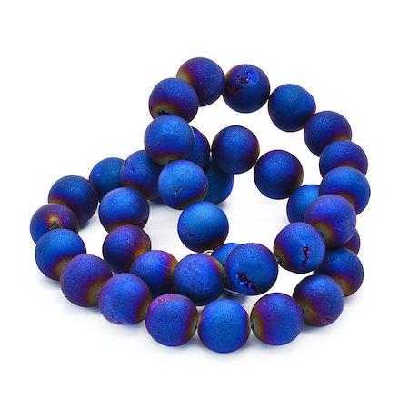 Natural agate druzy beads in a bright blue color. Stockbilder - Microstock & Abonnement, Bildnummer: 400-07794782