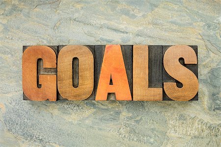 simsearch:400-07774007,k - goals  - a word in vintage letterpress wood type on a green slate rock background Foto de stock - Royalty-Free Super Valor e Assinatura, Número: 400-07794792