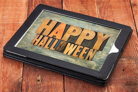 simsearch:400-07774007,k - Happy Halloween typography - letterpress  wood type printing blocks on a digital tablet Foto de stock - Royalty-Free Super Valor e Assinatura, Número: 400-07795424