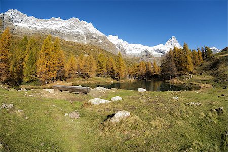 Matterhorn and Blue Lake in autumn sunny day, Aosta Valley Foto de stock - Royalty-Free Super Valor e Assinatura, Número: 400-07796842