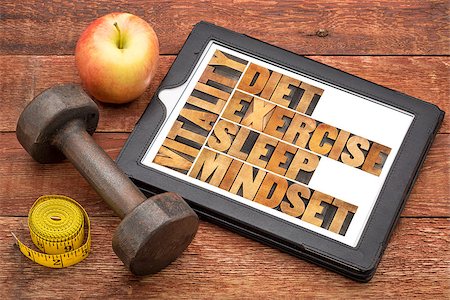 simsearch:400-08223086,k - diet, sleep, exercise and mindset - vitality concept - abstract in vintage letterpress wood type on a digital tablet with a dumbbell, apple and tape measure Stockbilder - Microstock & Abonnement, Bildnummer: 400-07796994