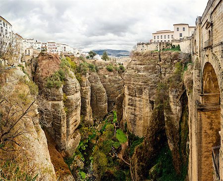puente nuevo - Amazing view of the Ronda canyon and the famous white village. Province of Malaga, Andalusia, Spain Photographie de stock - Aubaine LD & Abonnement, Code: 400-07791587