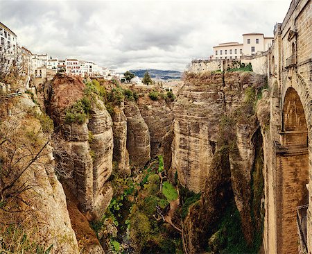 puente nuevo - Amazing view of the Ronda canyon and the famous white village. Province of Malaga, Andalusia, Spain Photographie de stock - Aubaine LD & Abonnement, Code: 400-07791583