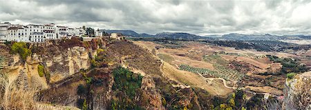 puente nuevo - Panoramic view of old city of Ronda and surrounding countryside. Province of Malaga, Andalusia, Spain Photographie de stock - Aubaine LD & Abonnement, Code: 400-07791591