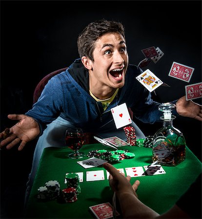 simsearch:400-06136085,k - Poker player winning Fotografie stock - Microstock e Abbonamento, Codice: 400-07791704