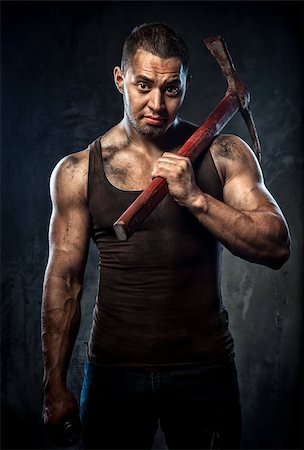 power ax - Muscular man holding pickaxe Stock Photo - Budget Royalty-Free & Subscription, Code: 400-07791742