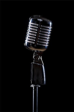 Professional vintage microphone isolated on black background Stock Photo - Budget Royalty-Free & Subscription, Code: 400-07792003