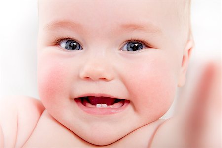 simsearch:400-06389659,k - Closeup portrait of adorable smiling baby girl Stock Photo - Budget Royalty-Free & Subscription, Code: 400-07792049