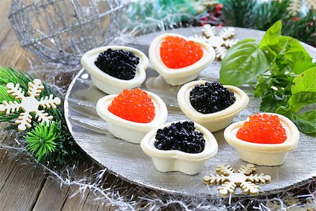 simsearch:400-07572419,k - Festive Christmas appetizer tartlets with red and black caviar Stock Photo - Budget Royalty-Free & Subscription, Code: 400-07792784