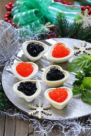 simsearch:400-07572419,k - Festive Christmas appetizer tartlets with red and black caviar Stock Photo - Budget Royalty-Free & Subscription, Code: 400-07792786