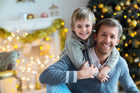 Dad and son at home Stock Photo - Budget Royalty-Free & Subscription, Code: 400-07792869
