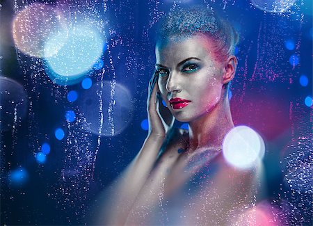 red lipstick art - Beautiful woman with creative bright make-up over glowing lights background Stock Photo - Budget Royalty-Free & Subscription, Code: 400-07793892