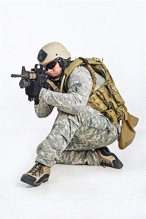 simsearch:400-05030782,k - SWAT Team Officer on white isolated background Stock Photo - Budget Royalty-Free & Subscription, Code: 400-07816681