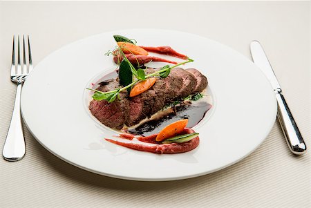 Roe deer fillet with vegetables, purple potato puree and red wine sauce Stock Photo - Budget Royalty-Free & Subscription, Code: 400-07816725
