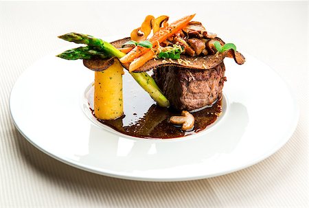 simsearch:400-04875293,k - Veal steak with boletus, vegetables, duck liver and red wine sauce Stock Photo - Budget Royalty-Free & Subscription, Code: 400-07816722