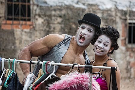 Laughing cirque clowns with makeup at clothing rack Stock Photo - Budget Royalty-Free & Subscription, Code: 400-07816996