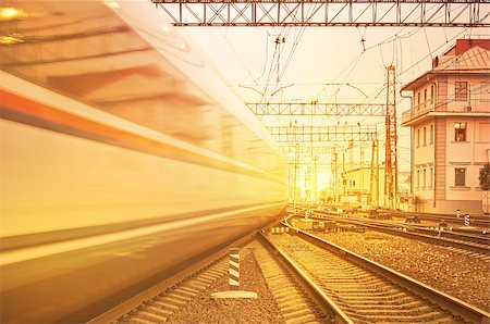 sunset railroad - Departure of high speed train at sunset. Stock Photo - Budget Royalty-Free & Subscription, Code: 400-07817033