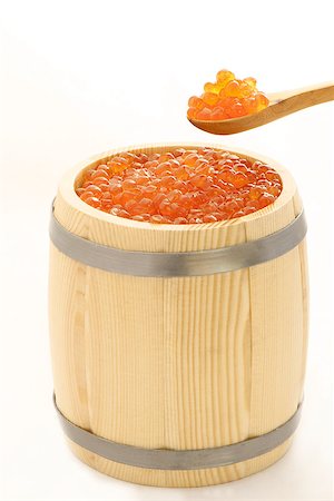 sturgeon - red salmon caviar in a wooden spoon and a barrel isolated on white. vertical. Stock Photo - Budget Royalty-Free & Subscription, Code: 400-07817182