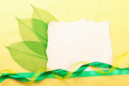 simsearch:400-07818732,k - Holidays card. Old paper with ribbons on yellow background. Stock photo Stock Photo - Budget Royalty-Free & Subscription, Code: 400-07817209