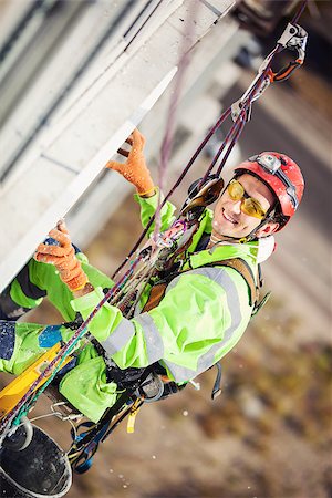 poliestireno - Industrial climber on a building Foto de stock - Super Valor sin royalties y Suscripción, Código: 400-07817355