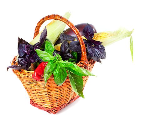 Vegetables in wicker basket. Isolated on white background. Stockbilder - Microstock & Abonnement, Bildnummer: 400-07817360