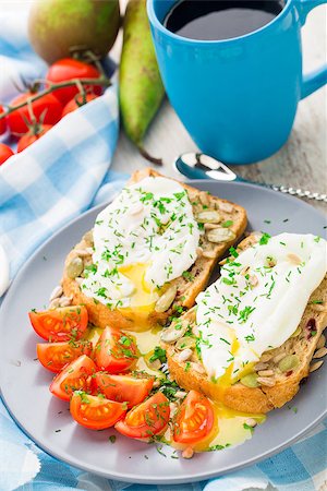 simsearch:400-08932342,k - Breakfast sandwich with poached egg and cherry tomatoes. Stock Photo - Budget Royalty-Free & Subscription, Code: 400-07817768