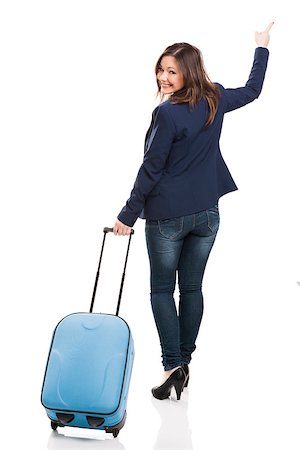 photos of tour guides at work - Business woman carrying a suitcase and looking back, isolated over white background Photographie de stock - Aubaine LD & Abonnement, Code: 400-07817917