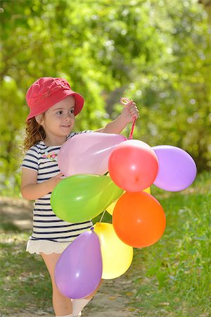 dress woman walk forest - girl plays in summer park with colorful baloons Stock Photo - Budget Royalty-Free & Subscription, Code: 400-07818220