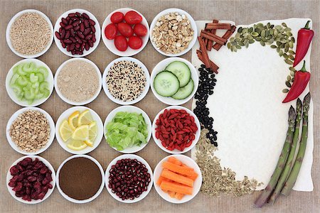 simsearch:400-06639690,k - Large weight loss diet health food selection in porcelain bowls over parchment and brown paper background. Photographie de stock - Aubaine LD & Abonnement, Code: 400-07818398