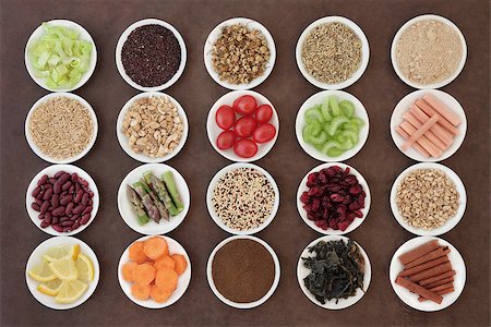 simsearch:400-08429907,k - Large diet health food selection in porcelain bowls over lokta paper background. Fotografie stock - Microstock e Abbonamento, Codice: 400-07818967
