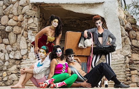 Group of serious bizarre clowns on outdoor stage Fotografie stock - Microstock e Abbonamento, Codice: 400-07819369