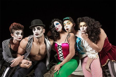 Five serious cirque clowns on theater stage Fotografie stock - Microstock e Abbonamento, Codice: 400-07819387