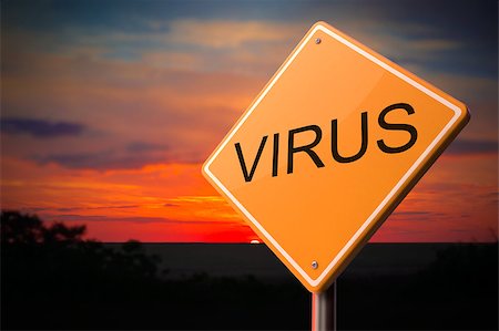 Virus on Warning Road Sign on Sunset Sky Background. Stock Photo - Budget Royalty-Free & Subscription, Code: 400-07819462