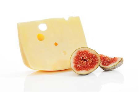 dutch cooking - Swiss cheese peace with fig fruit isolated on white background. Culinary gastronomy background. Stock Photo - Budget Royalty-Free & Subscription, Code: 400-07819529