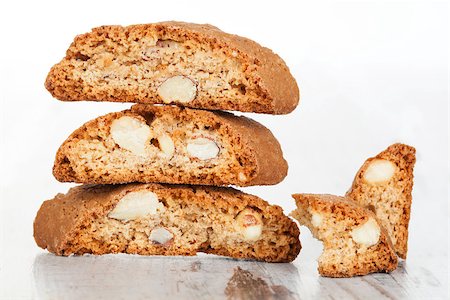 Delicious traditional italian cookie cantuccini detail on white wooden textured background. Culinary sweet dessert eating. Stock Photo - Budget Royalty-Free & Subscription, Code: 400-07819571