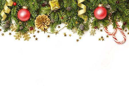 Christmas tree branches with red baubles,  golden stars, snowflakes isolated on white  -  horizontal border Stock Photo - Budget Royalty-Free & Subscription, Code: 400-07819719