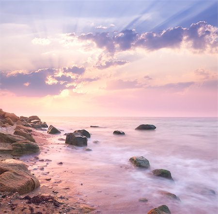 simsearch:400-07248425,k - Dawn sunrise landscape over beautiful rocky coastline in the Sea with sunbeams Photographie de stock - Aubaine LD & Abonnement, Code: 400-07819785