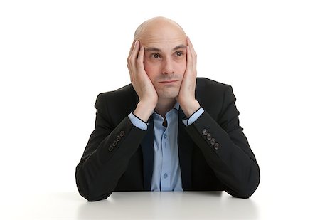 simsearch:400-07820348,k - Portrait of a thoughtful businessman. Isolated on white Photographie de stock - Aubaine LD & Abonnement, Code: 400-07824650