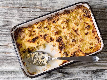 close up of a tray of rustic baked cauliflower cheese Stock Photo - Budget Royalty-Free & Subscription, Code: 400-07824772