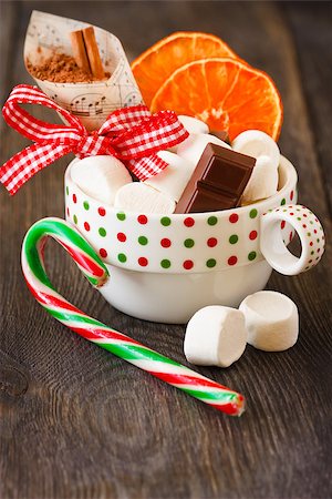 Christmas hot cocoa mix with chocolate, marshmallow and candy cane in mug. Stock Photo - Budget Royalty-Free & Subscription, Code: 400-07824829