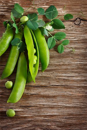 simsearch:400-04785141,k - Fresh green peas on an old wooden background with copy space. Stock Photo - Budget Royalty-Free & Subscription, Code: 400-07824841