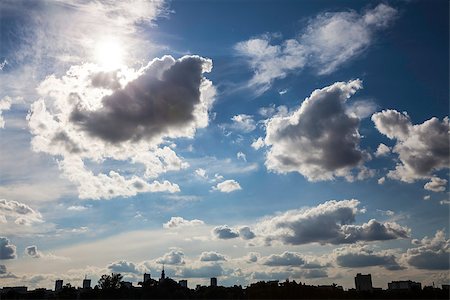 simsearch:400-05074402,k - Beautiful contrasting sky over the city. Can be used as a background. Foto de stock - Super Valor sin royalties y Suscripción, Código: 400-07825115