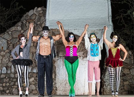 Group of happy cirque clowns holding hands Fotografie stock - Microstock e Abbonamento, Codice: 400-07825498