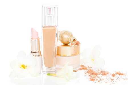 simsearch:400-09142582,k - Foundation, Facial powder, nail polish, eyeliner and lipstick with yellow flower and petals isolated on white background. Golden and Beige make up and cosmetics. Feminine concept. Foto de stock - Super Valor sin royalties y Suscripción, Código: 400-07825775