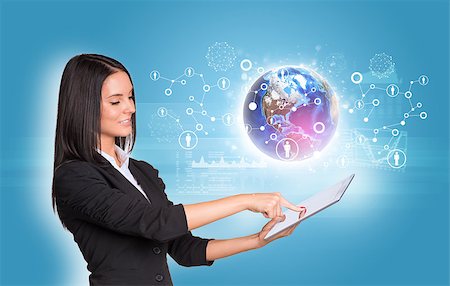 simsearch:400-07895693,k - Beautiful businesswomen in suit using digital tablet. Earth with graphs and network. Element of this image furnished by NASA Stock Photo - Budget Royalty-Free & Subscription, Code: 400-07825818