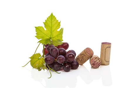 stopper - Red wine grapes and various corks isolated on white background with reflection. Culinary luxurious wine drinking. Stock Photo - Budget Royalty-Free & Subscription, Code: 400-07825868