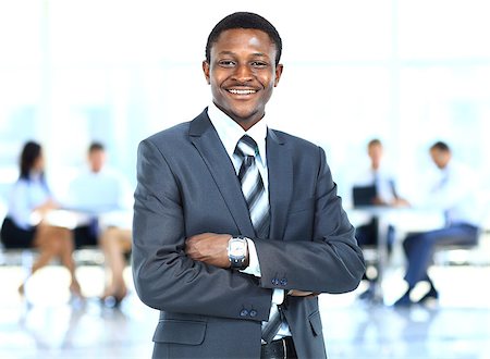 handsome young african american businessman in office Stock Photo - Budget Royalty-Free & Subscription, Code: 400-07826937
